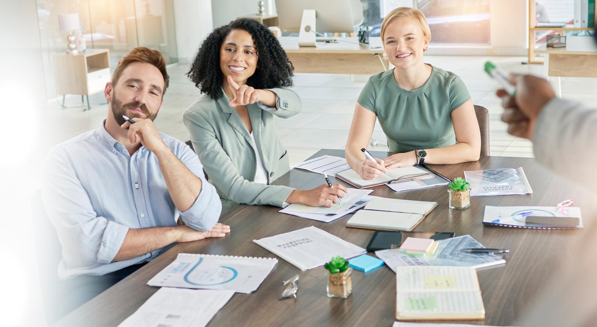 Small team discussing financial plan in a bright office